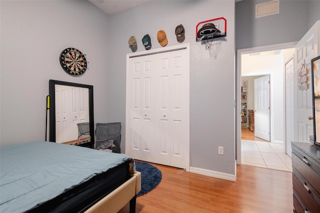 bedroom with light wood-type flooring