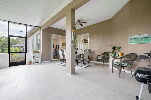 view of patio / terrace featuring ceiling fan