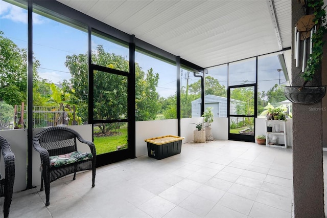 sunroom / solarium featuring a wealth of natural light