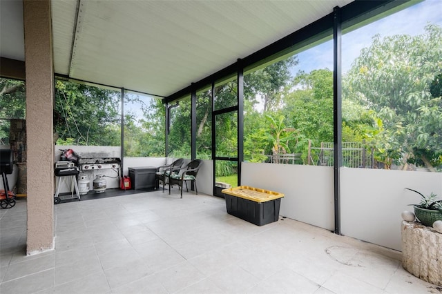 sunroom with plenty of natural light