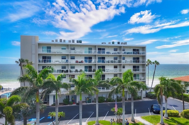 view of building exterior with a water view