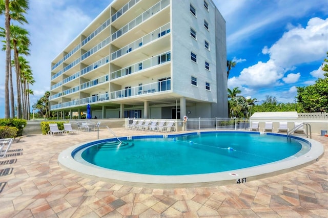 view of pool featuring a patio