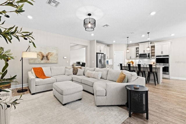 living room with light wood-type flooring