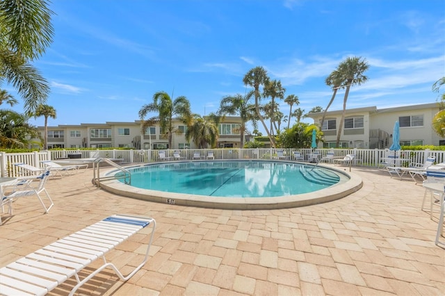 view of pool featuring a patio