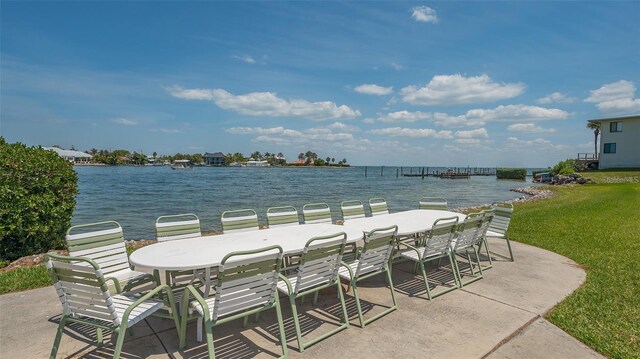 view of patio featuring a water view