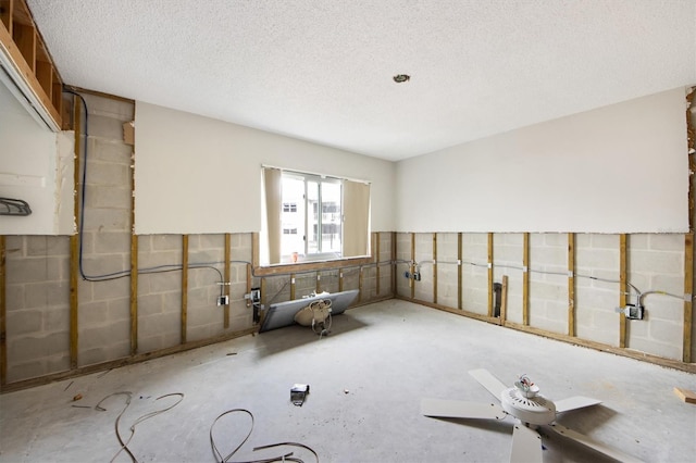 empty room with a textured ceiling