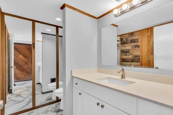 1502 NE Buckeye Rd NE Unit 2, Winter Haven, FL 33881 - bathroom with marble finish floor, recessed lighting, toilet, a bidet, and vanity