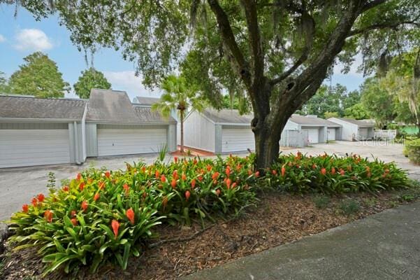 1502 NE Buckeye Rd NE Unit 2, Winter Haven, FL 33881 - view of front of property with a garage
