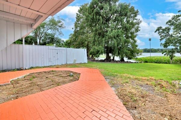1502 NE Buckeye Rd NE Unit 2, Winter Haven, FL 33881 - view of patio featuring fence