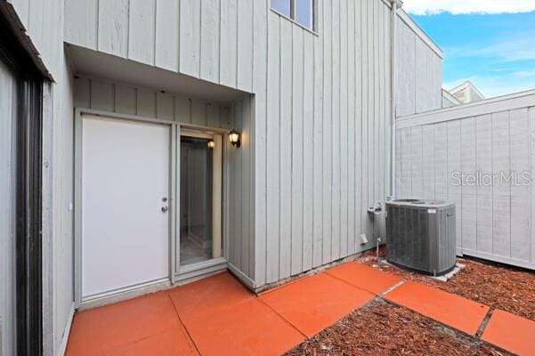 1502 NE Buckeye Rd NE Unit 2, Winter Haven, FL 33881 - view of patio / terrace with fence and cooling unit