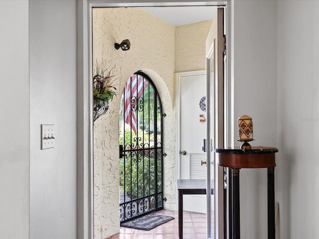 view of tiled entrance foyer