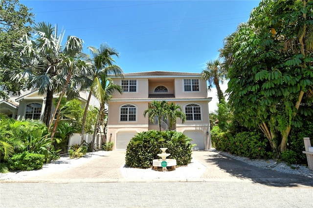 view of front of home with a garage