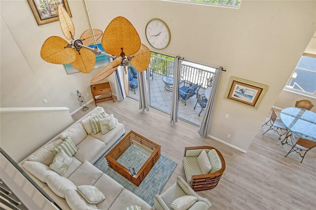 living room with a healthy amount of sunlight and light wood-type flooring