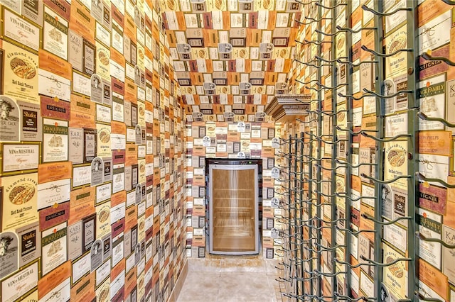 wine area featuring light tile patterned floors