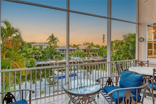 view of balcony at dusk