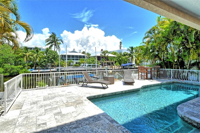 view of pool with a patio area