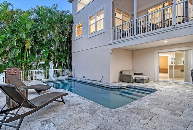 view of swimming pool featuring a patio area and outdoor lounge area