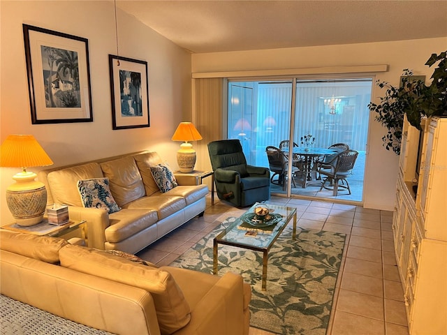 tiled living room featuring vaulted ceiling