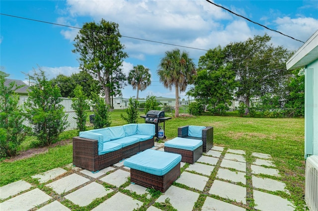 view of patio / terrace with outdoor lounge area, fence, and grilling area