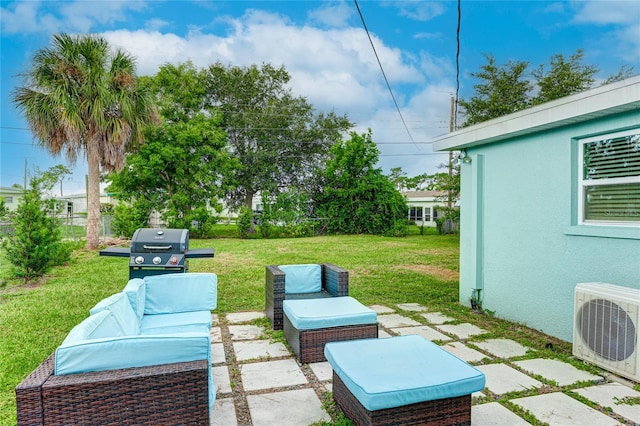 view of patio / terrace with ac unit, outdoor lounge area, and area for grilling