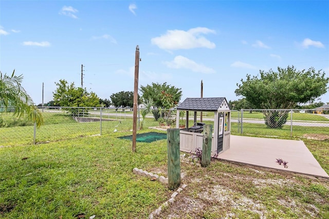 view of home's community with a lawn