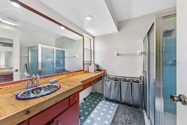 bathroom featuring vanity and tile patterned floors