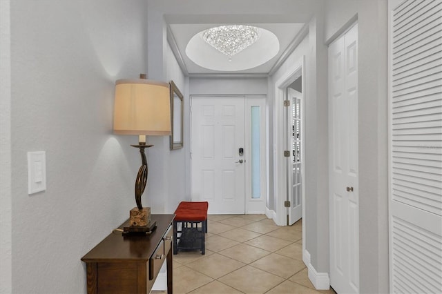 entrance foyer with light tile patterned floors