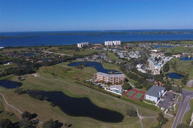 aerial view with view of golf course and a water view