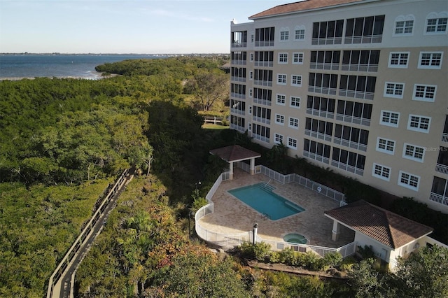 view of pool with a water view and a gazebo