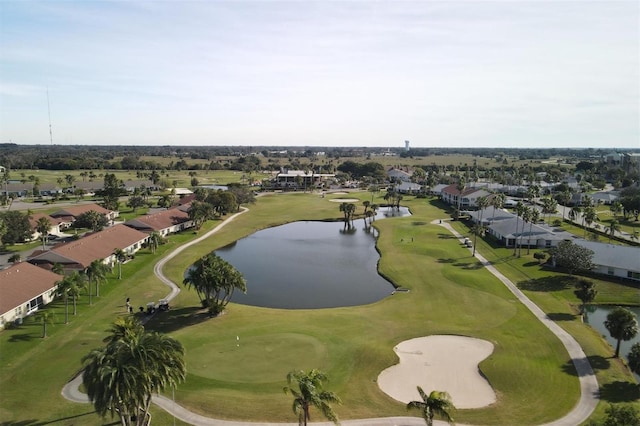 aerial view featuring view of golf course, a water view, and a residential view