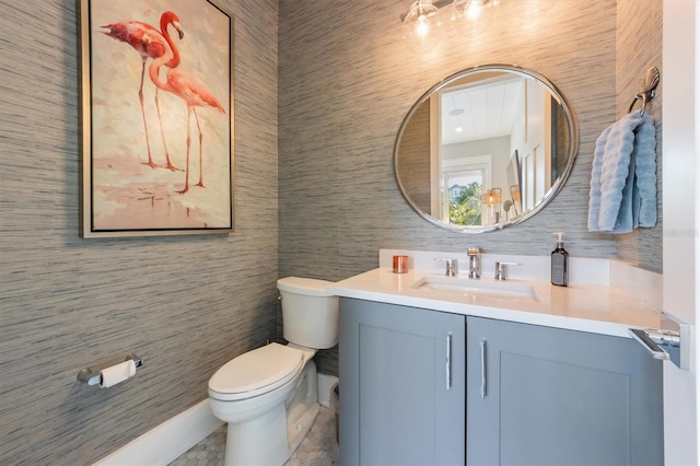 bathroom with tile walls, tile patterned flooring, vanity, and toilet