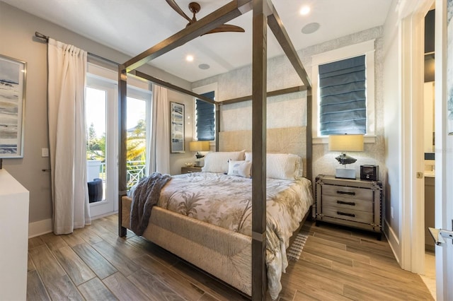 bedroom featuring ceiling fan and wood-type flooring