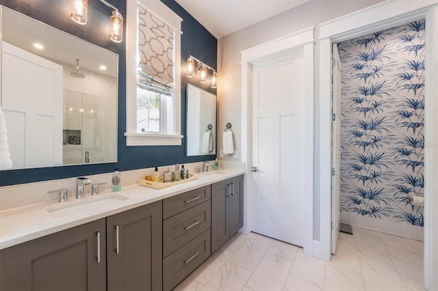 bathroom with dual vanity and tile patterned flooring