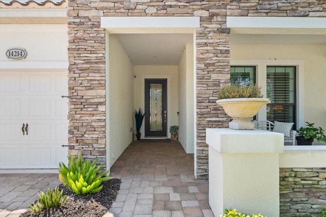 property entrance featuring a garage