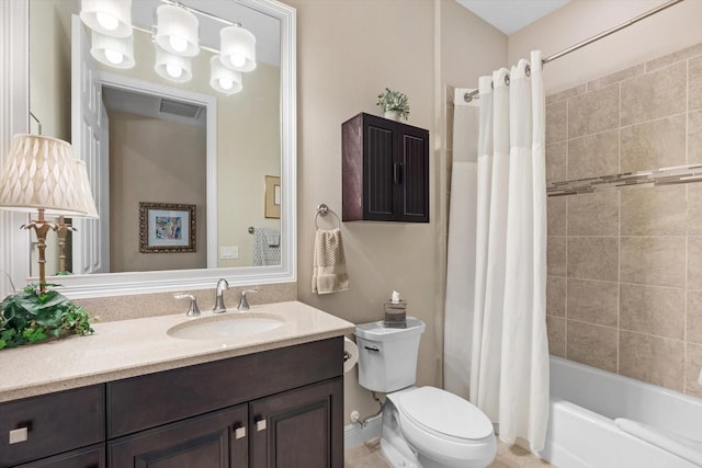 full bathroom with vanity, toilet, and shower / tub combo with curtain