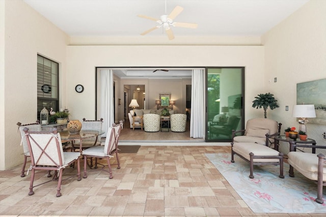 dining room featuring ceiling fan