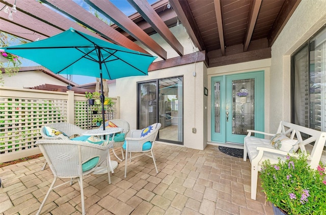 view of patio featuring a pergola