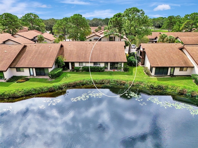 bird's eye view with a water view