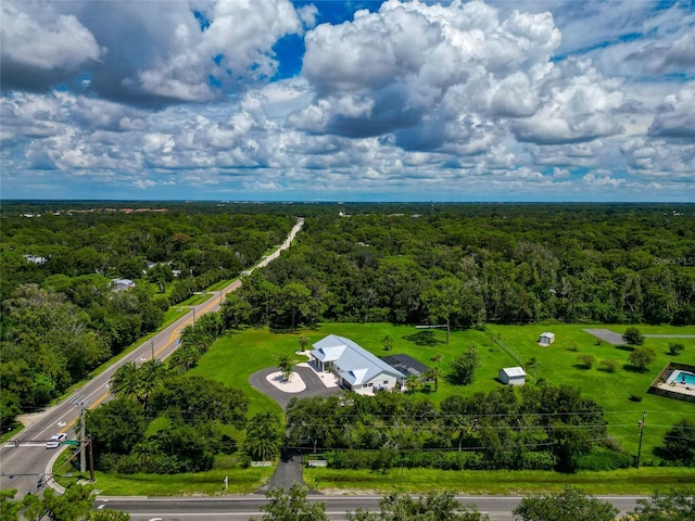 aerial view featuring a view of trees