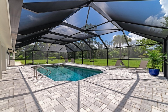 pool featuring a lanai, a lawn, and a patio