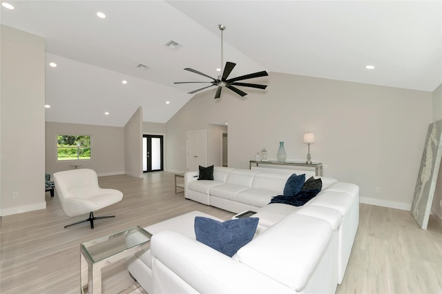 living room featuring light wood-style flooring, recessed lighting, baseboards, and visible vents