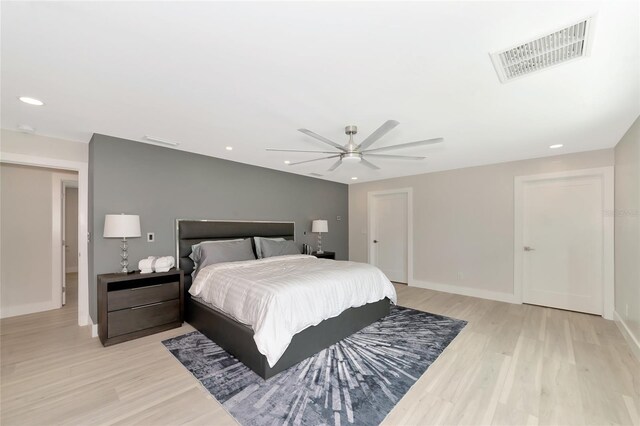 bedroom with visible vents, recessed lighting, baseboards, and light wood-style floors