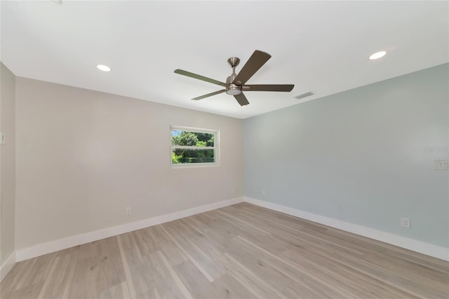 unfurnished room with light wood-type flooring, visible vents, recessed lighting, baseboards, and ceiling fan