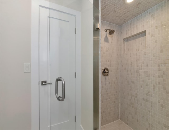 bathroom featuring a stall shower