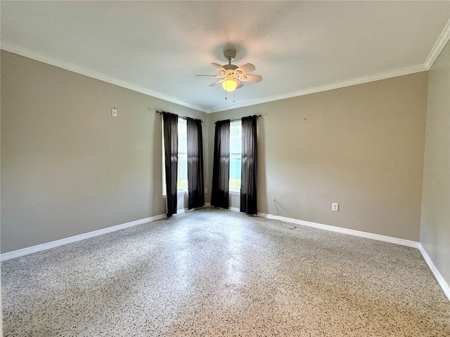 unfurnished room featuring ceiling fan and crown molding