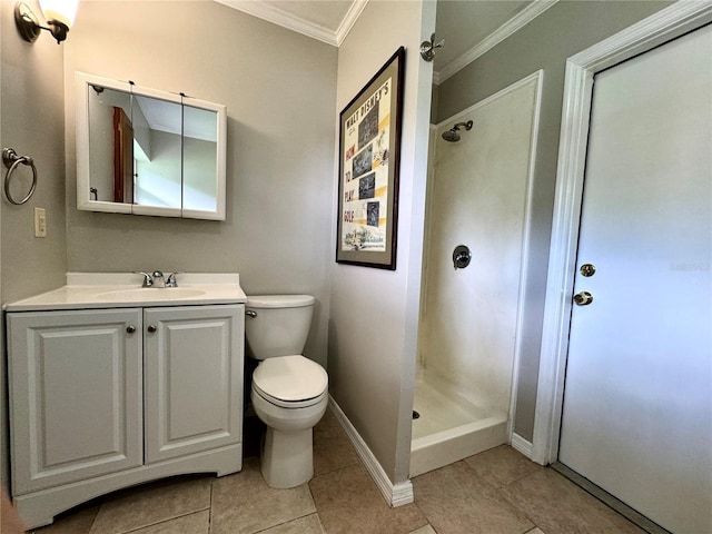 bathroom with tile patterned floors, vanity, crown molding, toilet, and walk in shower