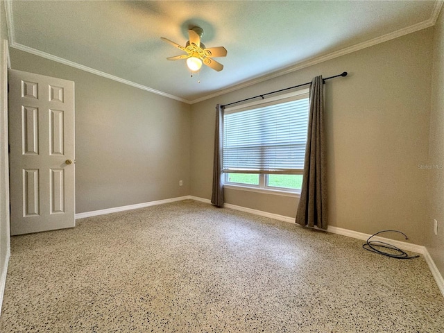 unfurnished room with ceiling fan and ornamental molding