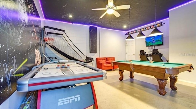 recreation room featuring concrete floors, billiards, and ceiling fan