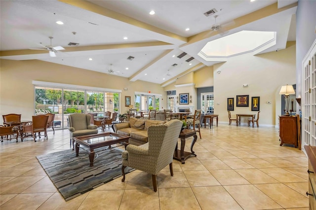 living room featuring beam ceiling, ceiling fan, high vaulted ceiling, and light tile patterned flooring