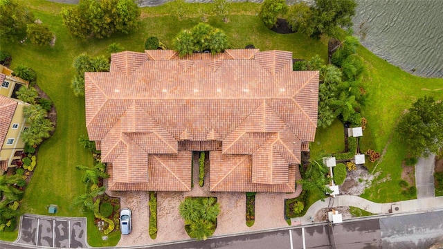 birds eye view of property featuring a water view